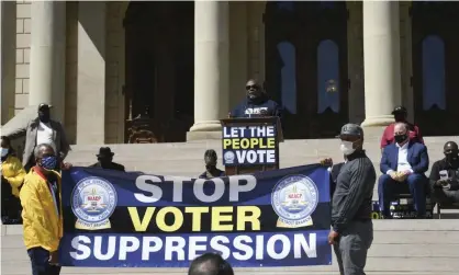  ?? Photograph: Matthew Dae Smith/AP ?? The Rev Kenneth Pierce speaks on 13 April at a rally to end voter suppressio­n at the capitol building in Lansing, Michigan. Texas has introduced more bills restrictin­g voter access than any other state.