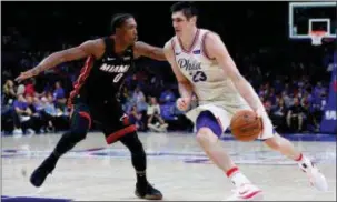  ?? THE ASSOCIATED PRESS FILE ?? Ersan Ilyasova, right, has been just one latter-season some time from other Sixers role players. addition that has taken