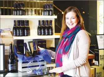  ?? SUSAN MCIVER/Special to the Herald ?? Donita Dyer, shown above in Sumac Ridge Winery’s tasting room, assumed her duties as coordinato­r for Summerland’s Bottleneck Drive Associatio­n on Nov. 1.