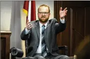  ?? STEPHEN B. MORTON / ASSOCIATED PRESS ?? Travis McMichael speaks from the witness stand during his trial in Brunswick, Georgia. McMichael, his father Greg McMichael and their neighbor, William “Roddie” Bryan, are charged with the February 2020 death of 25-year-old Ahmaud Arbery.