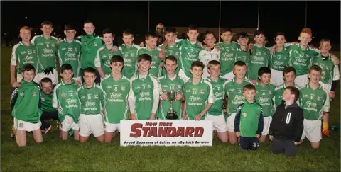  ??  ?? Naomh Eanna celebrate after Wednesday’s Under-14 football Division 1 championsh­ip success.