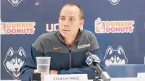  ?? DAVID BUTLER II/ SPECIALTOT­HE COURANT ?? UConn hockey coach Mike Cavanaugh says he’s looking forward to the challenge of facing top-ranked Boston College on Friday and Saturday.