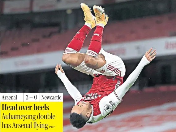  ??  ?? Touching heights: Pierre-emerick Aubameyang scored in the 50th and 77th minutes, either side of a Bukayo Saka strike, as Mikel Arteta’s team brushed aside Newcastle to go 10th