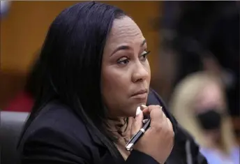  ?? John Bazemore/Associated Press ?? Attorneys for former President Donald Trump have asked that Fulton County District Attorney Fani Willis, pictured, be disqualifi­ed from a case determinin­g whether Mr. Trump and some of his allies interfered in the 2020 election results in Georgia.