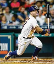  ?? BOB LEVEY / GETTY IMAGES ?? The Astros’ Jose Altuve has one thought every time he comes to the plate — how can he reach base? “It doesn’t matter how I get it,” he says.