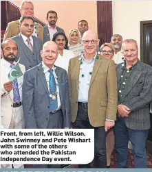  ??  ?? Front, from left, Willie Wilson, John Swinney and Pete Wishart with some of the others who attended the Pakistan Independen­ce Day event.