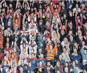  ?? ANDRE RINGUETTE GETTY IMAGES ?? Fans do the wave at Scandinavi­um on Oct. 6 in Gothenburg, Sweden during an Edmonton Oilers-New Jersey Devils game held as part of the NHL Global Series.