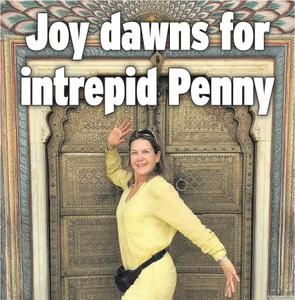  ??  ?? DOOR TO THE WORLD: Penny Smith experience­d some incredible places on her escorted holiday across India