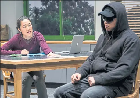  ?? T. CHARLES ERICKSON — BERKELEY REPERTORY THEATRE ?? Gina (played by Jackie Chung, left) confronts a student (Daniel Chung) about his disturbing writings in Julia Cho’s “Office Hour” at Berkeley Repertory Theatre.