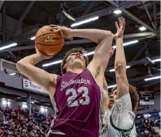  ?? Photos by Stephen Weaver/special to the Times Union ?? James Cocozzo of Stillwater takes a shot in the Class B state title game on Friday. Cocozzo helped spark a 16-0 run that put the Warriors in front for good.