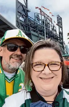  ?? Courtesy of Tim Mollette-Parks ?? Danielle and Tim Mollette-Parks attend an Oakland A’s game in 2021. Like many avid fans, she felt betrayed by the team’s planned move to Las Vegas.