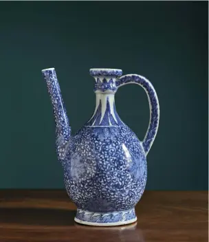  ??  ?? 3. Ewer, 1650s, Arita, Japan, porcelain, ht 23.5cm
Oribe sake bottle (tokkuri), 1615–20, Mino, Japan, glazed stoneware, ht 20cm