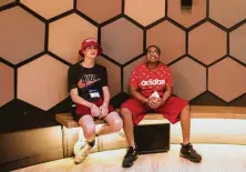  ?? Andre Chung / For the Washington Post ?? Christian Ferron, left, 13, and Robert Jackson, 12, on a school trip from St. Bernard’s Catholic School in Omaha, Neb., take in the exhibit at the Museum of the Bible.