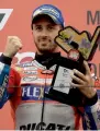  ?? AFP ?? Ducati’s Andrea Dovizioso poses on the podium after winning in Japan. —