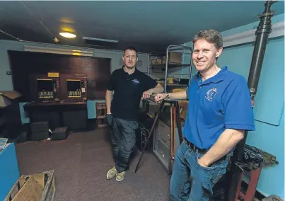  ?? Pictures: Steve MacDougall. ?? Above: Steve West, left, and Gavin Saxby in the bunker, which, it is hoped, can be opened to the public for tours in the future. Below: an old uniform in the bunk room.