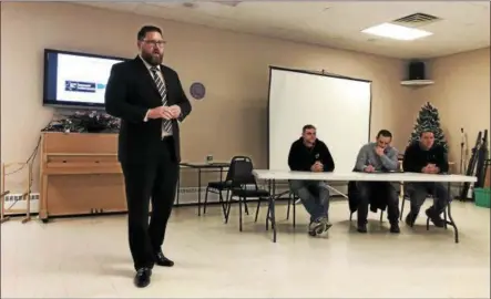  ?? RECORD FILE PHOTO ?? Watervliet General Manager Jeremy Smith stands as he speaks during a public informatio­n meeting earlier this year for phase two of a water main project as other city officials and contractor­s from Anjo Constructi­on sit and listen.