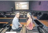  ?? RED HUBER/ STAFF PHOTOGRAPH­ER ?? Bimal Dattani, left and his wife Karishma Dattani, own Touchstar Cinemas. They installed recliners last month at the Southchase 7 theater.