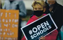  ?? ANDACHU— STAFF ARCHIVES ?? Alexander Kilimnik, 11, a sixth-grade student, and other students and parents gather for a quiet protest and sit-in against continued school closures at Thousand Oaks Elementary School in Berkeley on Jan. 13.