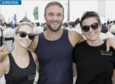  ??  ?? Rachel Davis and Etain McGuckian of Remedy Pilates with David Flynn of the Happy Pear at the Sumo Run in Bray in aid of Purple House.