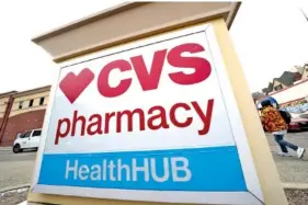  ?? AP PHOTO/GENE J. PUSKAR ?? A CVS store sign is displayed Friday in Pittsburgh.