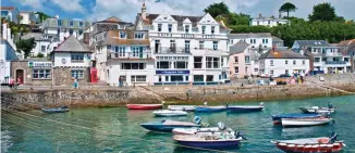  ??  ?? What a catch: The harbour at St Mawes where children can go crabbing