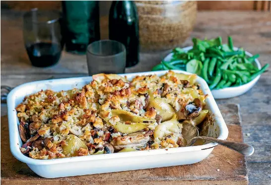  ?? SARAH TUCK ?? Serve this chicken and mushroom pasta bake with crunchy parmesan crumb with herby green beans.