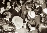  ??  ?? Top Yves Saint Laurent is presented to Princess Margaret, on the occasion of showing his frst collection for Dior, at Blenheim in 1958; the catwalk show, 1954. Right Arrival at Blenheim, 1954; Saint Laurent surrounded at a press conference, 1958