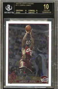  ??  ?? On June 10, this 2003-04 Topps Chrome #111 Lebron James RC reportedly sold for $57,100 – an amazing sum considerin­g the card sold for under $8K four years ago.