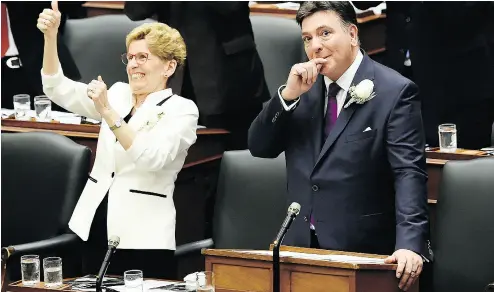  ?? NATHAN DENETTE / THE CANADIAN PRESS FILES ?? Premier Kathleen Wynne and Finance Minister Charles Sousa on Ontario budget day.