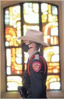  ?? DELCIA LOPEZ/ASSOCIATED PRESS ?? Robert Jackson, with Texas Department of Public Safety, attends the Blue Mass at the Basilica of Our Lady of San Juan del Valle on Wednesday in San Juan, Texas.