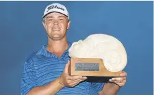  ??  ?? Patton Kizzire survived a late charge by Rickie Fowler to clinch his breakthrou­gh win on the PGA Tour. He had a one shot success in the OHL Classic in Mayakoba, Mexico.