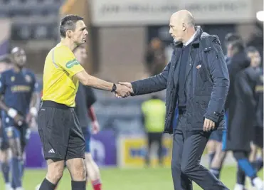  ?? ?? Philippe Clement shakes the hand of referee Kevin Clancy at Dens Park in November