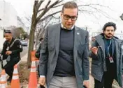  ?? ANDREW HARNIK/AP ?? Rep. George Santos, R-N.Y., leaves a House GOP conference meeting Wednesday on Capitol Hill.