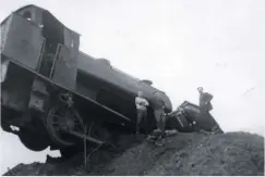  ?? LLYNFI VALLEY HISTORICAL SOCIETY ?? Dramatic photograph­s have come to light showing Bagnall ‘Austerity’ 0‑6‑0ST Works No. 2766 hanging precarious­ly from a spoil tip at St John’s Colliery, Maesteg. The incident is thought to have occurred in 1971 or 1973, when it lost control of an...