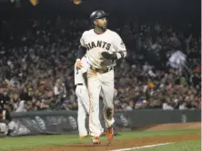  ?? Jeff Chiu / Associated Press ?? Third baseman Eduardo Nuñez’s move to Boston could clear the way for Pablo Sandoval’s return to San Francisco.