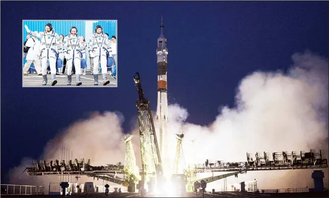  ??  ?? Russia’s Soyuz MS-05 rocket carrying a three-man crew from Italy, Russia and the United States, blasts off on July 28, from the Baikonour cosmodrome for a five-month mission on the Internatio­nal Space Station (ISS). (Inset): US astronaut Randy Bresnik...