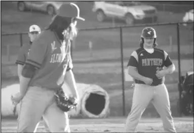  ?? Photo by Alexis Meeks ?? Glen Rose pitcher Colton Hixon eyes Magnet Cove’s Lucas Smeltzer while at first base during their game Wednesday. Smeltzer had the game winning hit that drove in two runs to give the Panthers the win over the Beavers, 6-5.