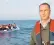  ??  ?? Reporter Simon Jones was aboard a boat alongside a migrants’ dinghy when he made the live broadcast