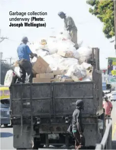  ?? (Photo: Joseph Wellington) ?? Garbage collection underway