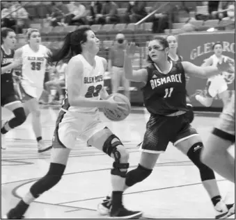  ?? Photo by Alexis Meeks ?? Glen Rose’s Love Doddridge goes in for a layup against Bismarck’s Alivia Gordon during Tuesday’s rivalry game at the Glen Rose Arena.