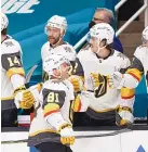  ?? JOSIE LEPE/ASSOCIATED PRESS ?? Golden Knights center Jonathan Marchessau­lt (81) celebrated with the Vegas bench after scoring a first-period goal against San Jose on Saturday.