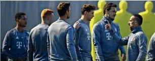  ?? AFP ?? Bayern Munich’s players get ready for Borussia Dortmund match. —