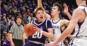  ?? JEFF GILBERT / CONTRIBUTE­D ?? Fairmont’s Brock Baker goes strong to the basket against Cincinnati Elder’s Sam Whitmer at Saturday’s Division I district final.