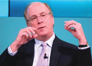  ?? – Reuters photo ?? There are no signs that the global economy is sliding towards a recession in the next 12 months, says Fink.