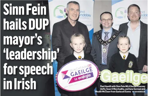  ?? PETER MORRISON ?? Paul Hamill with Sinn Fein MLA Declan Kearney (left), Sean O Murchadha, and Iona Gorman and Meabh McClean from Gaelscoil Eanna