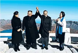 ?? PYONGYANG PRESS CORPS ?? North Korea’s Kim Jong Un and his wife, Ri Sol Ju, left, with South Korea’s President Moon Jae-in and his wife, Kim Jung-sook, on top of Mount Paektu in North Korea on Thursday.