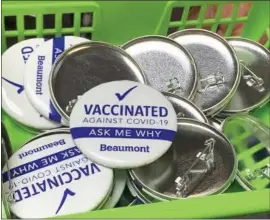  ?? MEDIANEWS GROUP FILE PHOTO ?? Beaumont vaccinatio­n pins.