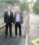  ??  ?? Slow down Councillor Nathan Wilson and MSP Graham Simson at the road safety improvemen­ts outside St Brendan’s Primary School in Motherwell. It follows a child knocked down there