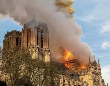  ??  ?? Iconic landmark: The Notre-Dame cathedral, once rebuilt, will still reflect a people whose long quarrel over national identity constitute­s its core identity, says the writer. - AP