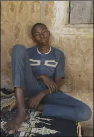  ?? SUNDAY ALAMBA/AP ?? Usama Aminu, 17 year-old, a kidnapped student of the Government Science Secondary School who escaped from bandits is seen during an interview with The Associated Press on Wednesday in Kankara, Nigeria.